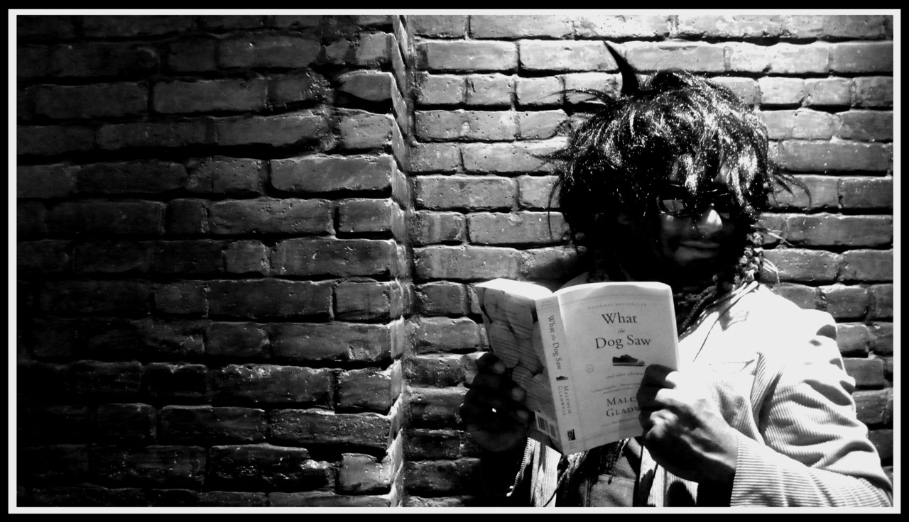 DISGUISE (BLACK WARHOL WIG, GLASSES, GLADWELL BOOK) 10,000 HOURS GOTTA START SOMEWHERE.